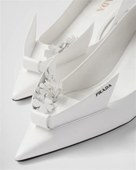 Prada White Brushed Leather Pumps With Floral Appliqués